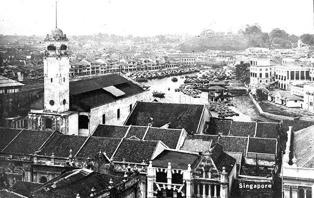 View of Singapore River and its surrounding buildings at Boat Quay. On the left is the tower of Guthrie and Company head office.