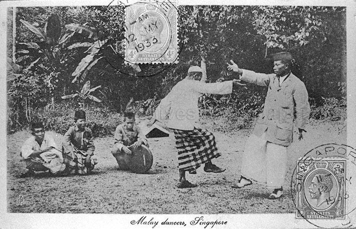 Malay men in Singapore dancing the "joget", a popular dance originating from Java