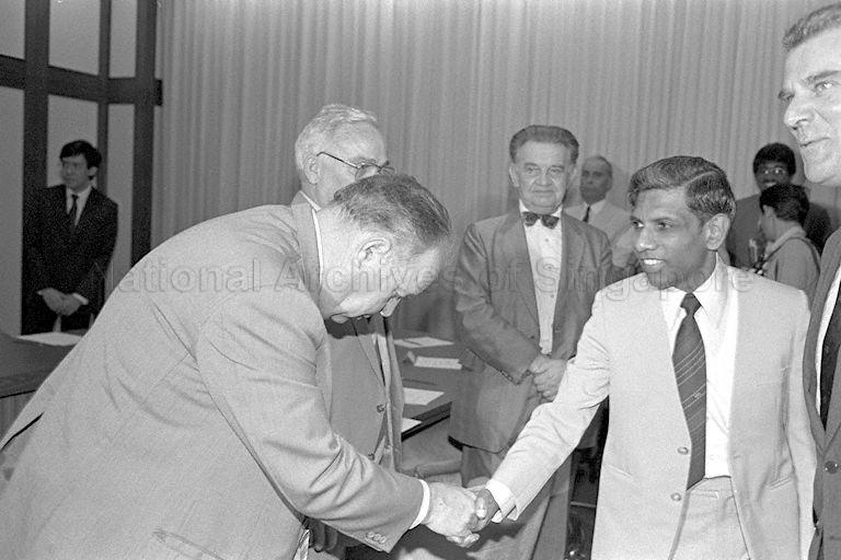 Foreign Minister S Dhanabalan (second from right) shaking hands with one of the French parliamentary delegates at Parliament House. Also present is French Ambassador to Singapore Jacques Berniere (far right). The French parliamentary delegation is in Singapore for a three-day official visit.