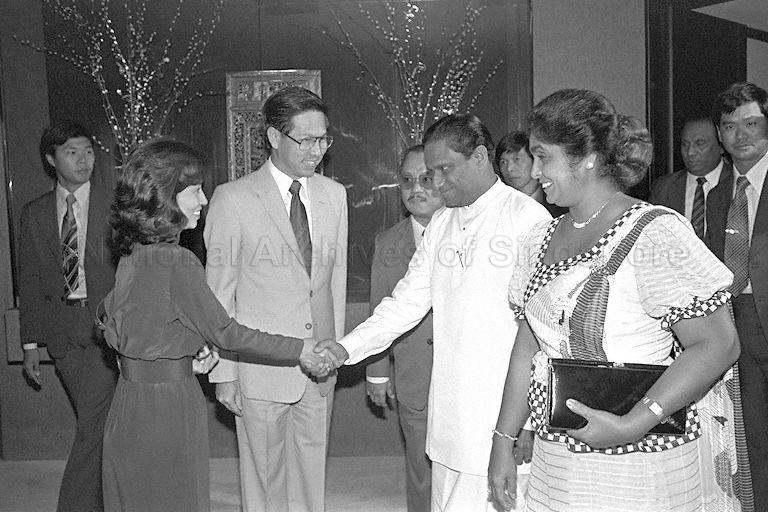 Second Deputy Prime Minister Ong Teng Cheong's wife Madam Ling Siew May (left) shaking hands with Sri Lankan Prime Minister Ranasinghe Premadasa (second from right) at the Dynasty Hotel. Also present are Second Deputy Prime Minister Ong (second from left) and Sri Lankan Prime Minister Premadasa's wife Madam Hema Wickramatunge (far right).
