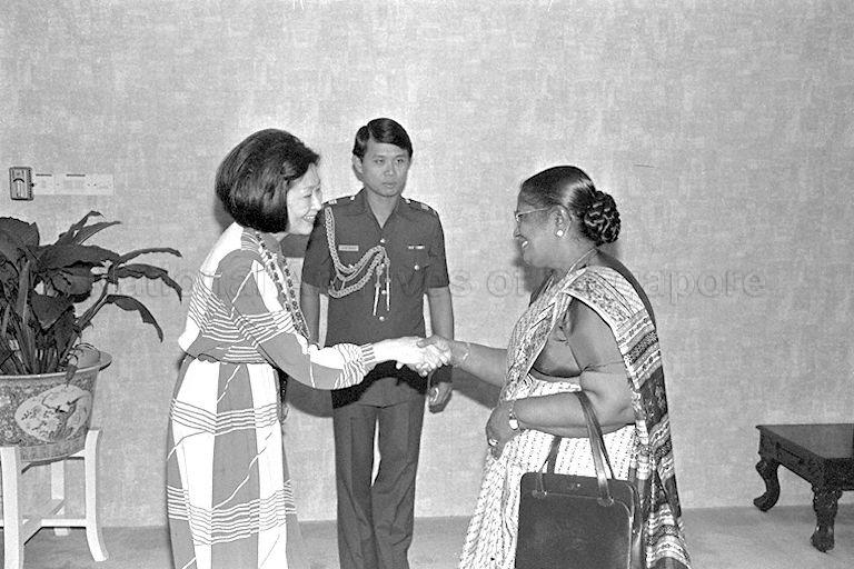 First Lady Madam Avadai Dhanam (right) shaking hands with wife of Greek Ambassador to Singapore Mrs Sioris (left) at the Istana.