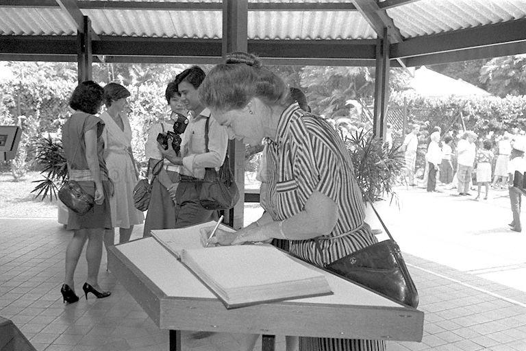 Australian Foreign Affairs Minister Bill Hayden's wife Mrs Dallas Hayden signing the guest book during the visit at the Botanic Gardens.
