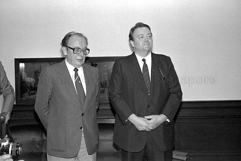 Premier of the state of Hesse in West Germany Holger Boerner (right), who is on a three-day visit to Singapore, with official at City Hall to call on Minister for Foreign Affairs and Community Development S Dhanabalan