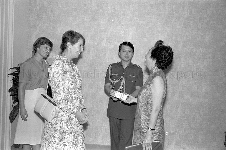 Acting First Lady Mrs Winnie Yeoh (right) and wife of Chilean Ambassador to Singapore Mrs E C Tesche (left, foreground) are at the Istana.