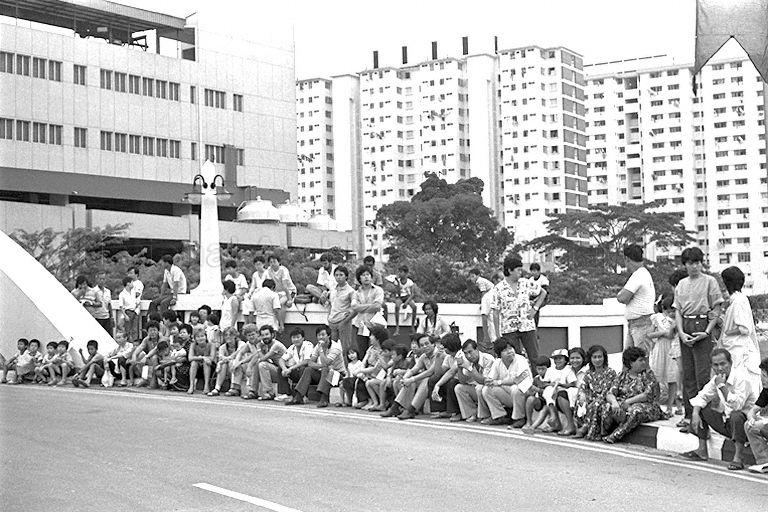 National Day Parade 1985 at National Stadium -- Residents waiting for the parade on the street