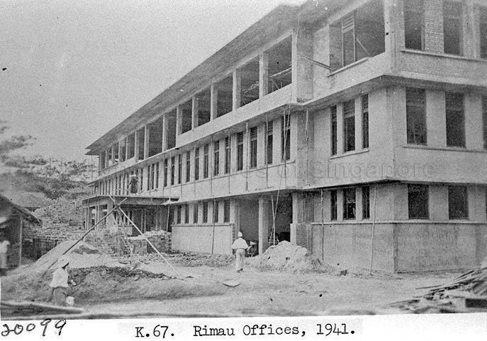 Picture of Rimau Offices at Singapore Naval Base. The photograph shows Rimau Offices in the final stages of construction in late 1941. Rimau Offices would be used as the Rimau Naval Base Police Asian Barracks from the late 1950s until 1971, when the force was disbanded with the withdrawal of British Forces from Singapore  (although families were permitted to live there until early 1972). The building would also be used by Woodbridge Hospital (now IMH) as View Road Hospital from 1975 to 2001 - used for the rehabilitative care of long term schizophrenic patients, many of whom were able to work on the premises or in the factories in the area in the day time. It was also used as a foreign workers dormitory on two occasions and is currently unoccupied. The area is slated for redevelopment as part of the Woodlands North development.