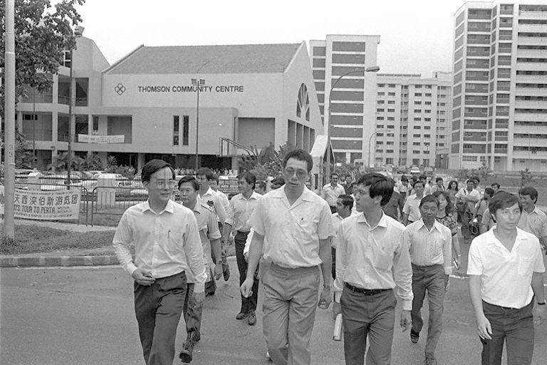 Minister of State for Defence and Trade and Industry Brigadier-General (Reservist) Lee Hsien Loong (centre) departing from the food distribution emergency exercise at Thomson Community Centre.