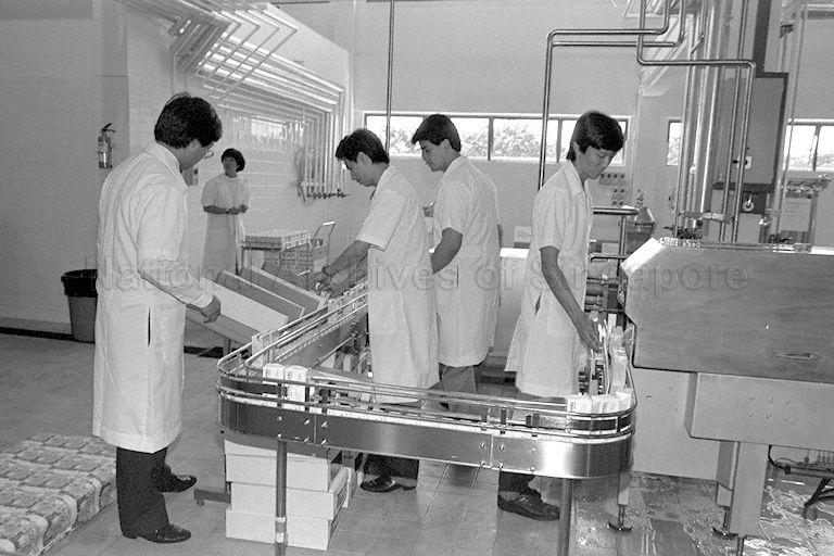 Employees at work during opening of Food Processing Research