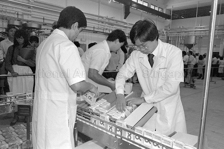 Employees at work during opening of Food Processing Research