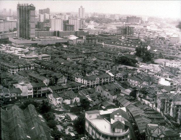 View of People's Park Complex under construction (high rise building, top left). This picture most likely taken from the Ministry of National Development (MND) Building at Maxwell Road gives a good partial oblique view of the low-rise houses in the older parts of Chinatown in South Bridge Road.