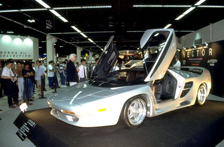 Car display at the 1992 Singapore Motorshow at IMM building in Jurong East Street 21. The silver Vector Avtech WX3 before it was painted teal. Vector CEO Gerald Wiegert meets Tommy Suharto at this show just months before they take over Vector Aeromotive.