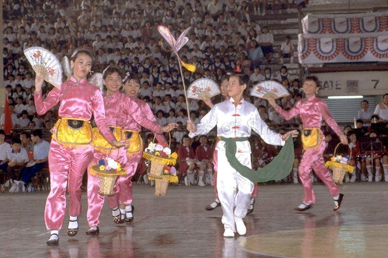 Chinese fan dance performance at Children's Day celebrations organised by Geylang District Primary Schools Sports Council at Gay World Stadium