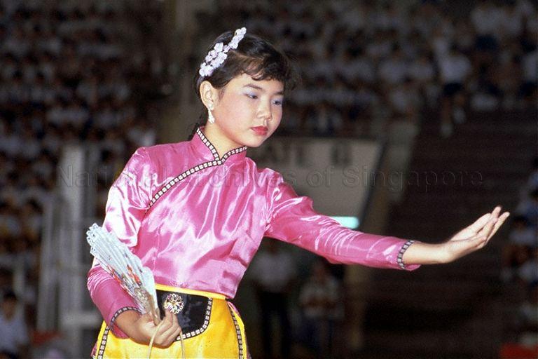 Chinese fan dance performance at Children's Day celebrations organised by Geylang District Primary Schools Sports Council at Gay World Stadium