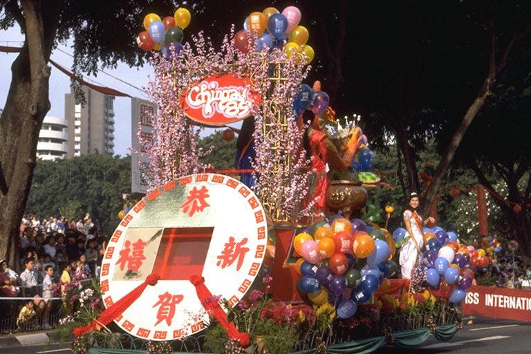 Beauty Pageant float, carrying the new beauty queen in the Year of Snake, taking part in Chingay parade along Orchard Road. Seven floats and more than 2,000 performers including stilt walkers, cultural dancers and skateboarders took part in the procession which showcased both local and foreign cultural performing groups. The annual street parade is the highlight of Singapore's Lunar New Year festivities.
