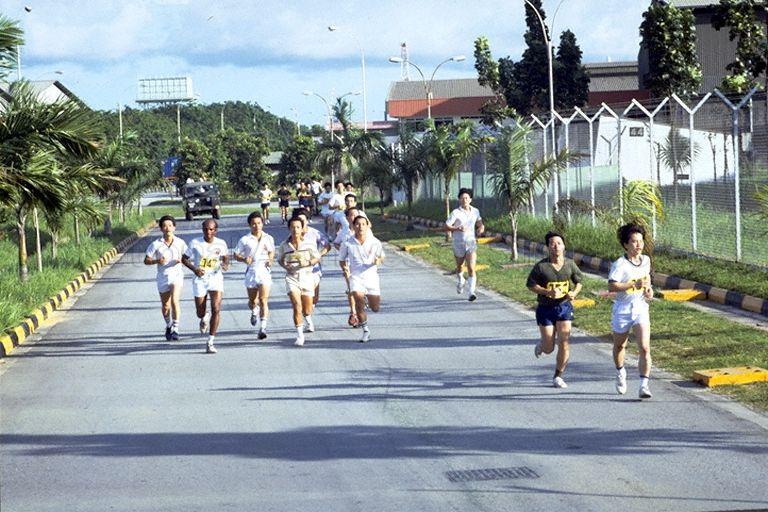 Scene of men running at the army's Sixth Division's Tanjong Gul Camp; photo taken when Minister for Communication and Information and Second Minister for Defence Dr Yeo Ning Hong visits the camp to attend a briefing on reservist in-training