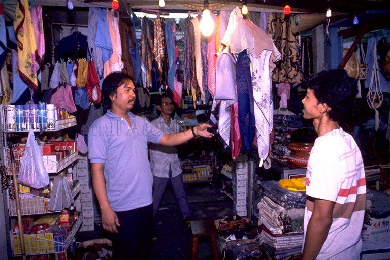Shopping in Jalan Sultan and Bussorah Street area in Kampong Glam during run-up to Hari Raya Puasa