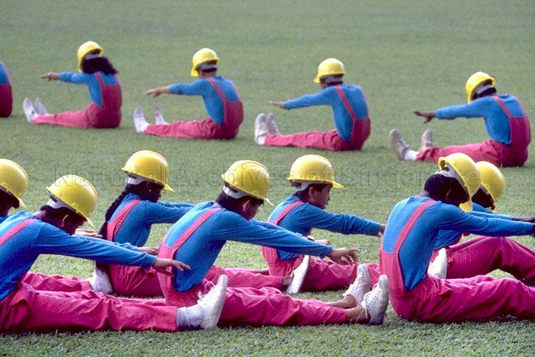 Students from Naval Base Secondary School participating in mass display at Singapore Youth Festival held in National Stadium. Engaging students from schools across Singapore involved in the performing arts, sports and uniformed group co-curricular activities (CCAs), the Festival is an annual event organised by Ministry of Education.