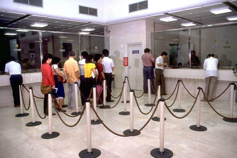 Customers waiting in line at Post Office Savings Bank (POSB