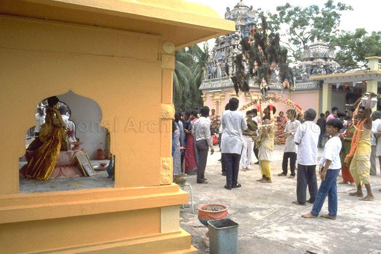 Devotee carrying kavadi during the Panguni Uthiram Festival which takes place on the full moon of the Tamil month of Panguni. The temple along Canberra Road is the Holy Tree Sri Balasubramaniam Indian Temple which has relocated to Yishun Industrial Park A, Yishun Avenue 7.