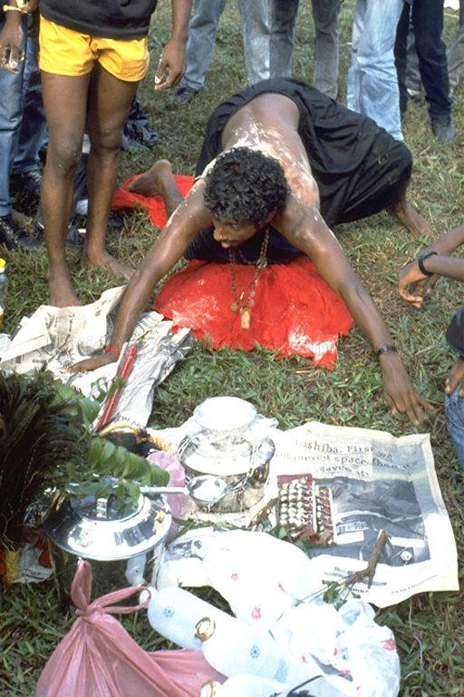 Devotee in ritual during the Panguni Uthiram Festival which is celebrated on the full moon of the Tamil month of Panguni at the Holy Tree Sri Balasubramaniam Indian Temple in Canberra Road. The temple has relocated to Yishun Industrial Park A, Yishun Avenue 7.