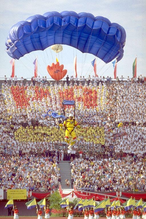 National Day Parade 1989 at National Stadium -- Free-falling performance by Parachute Training Wing of Singapore Armed Forces (SAF) School of Commandos