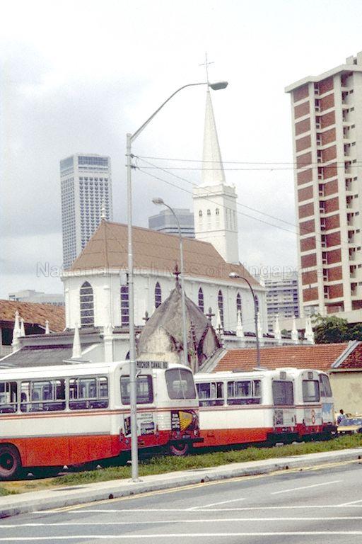 Queen Street bus terminal at the junction of Rochor Canal Road and Ban San Street. In the background is the Church of Our Lady of Lourdes.