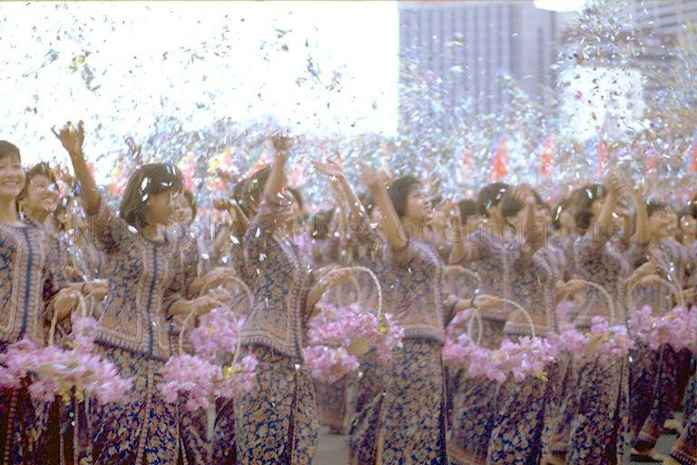 National Day Celebrations -- Singapore Airlines (SIA) girls throw flowers in the air