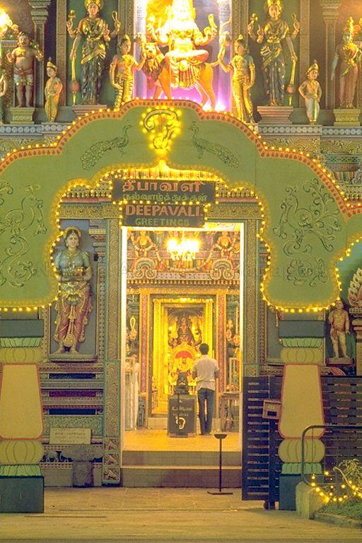 Image of Sri Vadapathira Kaliamman Temple at 555 Serangoon Road. Statues and structures are consistent with today's appearance. This is an important image that depicts the changes in the infrastructure of the temple. This image was taken before a Kodimaram (temple flagstaff) was installed. The kodimaram can be seen today in the center of the prayer hall.