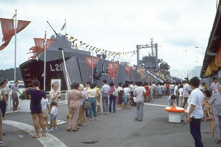 Visitors queuing up to board Landing Ship Tank (LST), RSS Resolution, L204, during National Exhibition at World Trade Centre. The 4080-tonne naval ship is put up by the Republic of Singapore Navy for the exhibition.