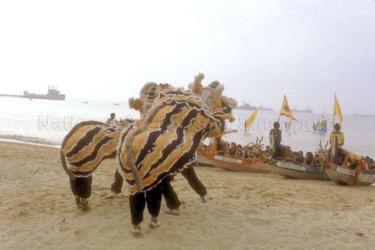 Performance by two southern lions from Dan Ma Xi lion dance troupe at Pesta Sukan Sea Carnival at East Coast Parkway