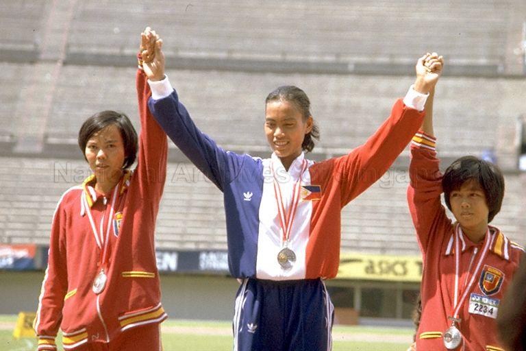 Southeast Asian Games (SEA Games) - Medal winners for 100m women's hurdles event at National Stadium. Agripina Dela Cruz from the Philippines (centre) won the gold, Nwe Nwe Yee from Burma (left) won the silver and San San Aye from Burma won the bronze.