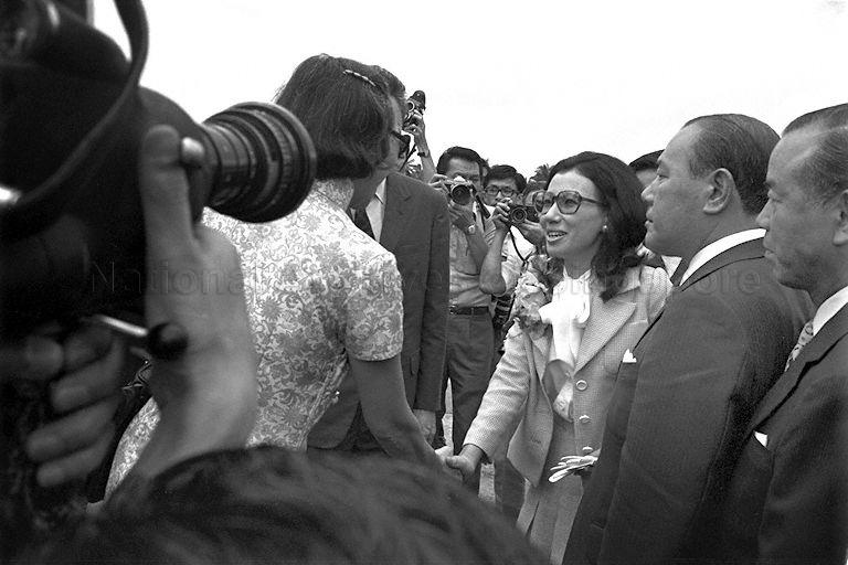 Mdm Kwa Geok Choo, wife of Prime Minister Lee Kuan Yew shaking hands with Mrs Makiko Tanaka, daughter of Japanese Prime Minister Kakuei Tanaka. Looking on (2nd from right) is PM Tanaka. The Japanese Prime Minister is in Singapore on a short visit as part of his Asian tour.