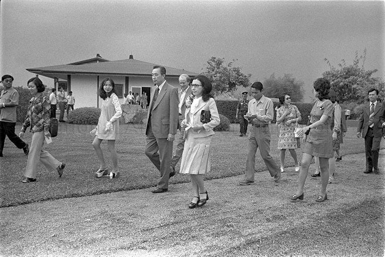 Mrs Makiko Tanaka, daughter of Japanese Prime Minister Kakuei Tanaka, touring Jurong Japanese Garden. She is accompanied by Chairman of Jurong Town Corporation (JTC) Woon Wah Siang. Her father, the Japanese Prime Minister is in Singapore on a short visit as part of his Asian tour.