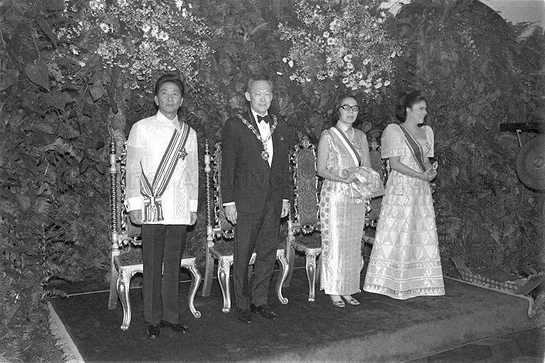Prime Minister (PM) Lee Kuan Yew and Mrs Lee posing for photograph with President Ferdinand Marcos of the Philippines and Mrs Imelda Marcos at state dinner at Malacanang Palace. The dinner, held in honour of three-day visit by PM Lee, followed a ceremony at which the two heads of state exchanged awards -- the President conferring on PM Lee the Ancient Order of Sikatuna, rank of Rajah, and PM Lee giving him the Order of Temasek.