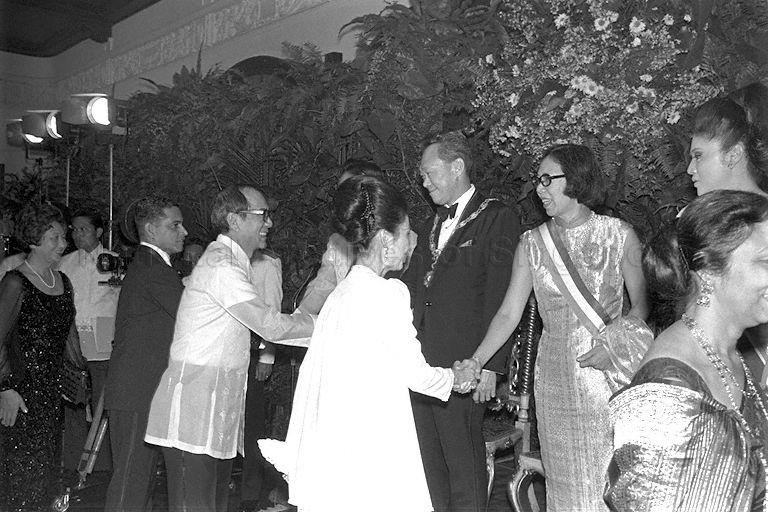 Prime Minister (PM) Lee Kuan Yew and Mrs Lee, together with hosts President Ferdinand Marcos of the Philippines and Mrs Imelda Marcos, being congratulated by guests, including PM Lee's private secretary A Sankaran (second from right, in dark suit), at state dinner at Malacanang Palace. The dinner, held in honour of three-day visit by PM Lee, followed a ceremony at which the two heads of state exchanged awards -- the President conferring on PM Lee the Ancient Order of Sikatuna, rank of Rajah, and PM Lee giving him the Order of Temasek.