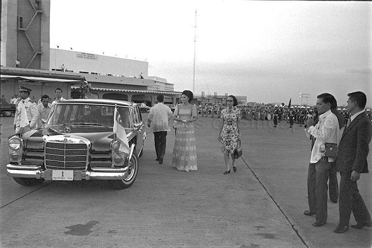 Mrs Imelda Marcos, wife of President Ferdinand Marcos of the Philippines, sending off Mdm Kwa Geok Choo, wife of Prime Minister Lee Kuan Yew at the Manila International Airport. PM Lee has completed his three-day official visit to Manila.