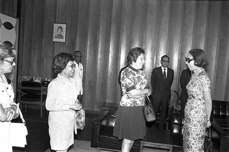 Mdm Kwa Geok Choo, wife of Prime Minister Lee Kuan Yew conversing with officials at Paya Lebar Airport lounge. Mdm Kwa and (2nd from right, in the background) Public Service Commission Chairman Dr Phay Seng Whatt are in Prime Minister Lee Kuan Yew's delegation, departing for Manila on a three-day official visit.