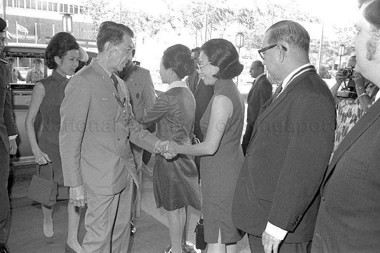 President Dr Benjamin Henry Sheares, who is also Chief Scout, being greeted by Chief Commissioner of Singapore Girl Guides Association Madam Chan Siok Fong upon arrival at Mandarin Hotel to attend buffet lunch organised by Singapore Scout Association and Singapore Girl Guides Association. Behind him is Mrs Sheares, who is patron of Singapore Girl Guides Association.