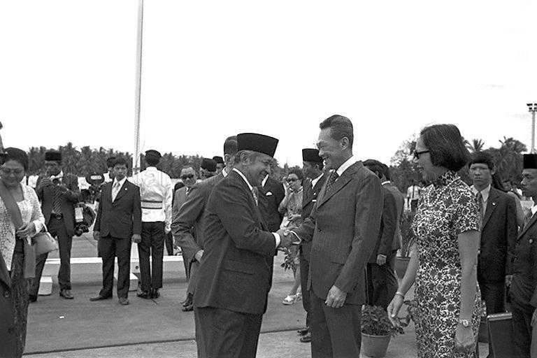 Prime Minister Lee Kuan Yew and Mrs Lee welcoming President Suharto of Indonesia upon his arrival at Paya Lebar Airport for a three-day state visit to Singapore.