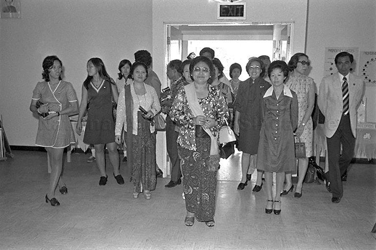 Mrs Tien Suharto, wife of Indonesian President, visits Girl Guides Association during her three-day state visit to Singapore. Accompanying her is Mrs Lee Kuan Yew (second from right), wife of Prime Minister.