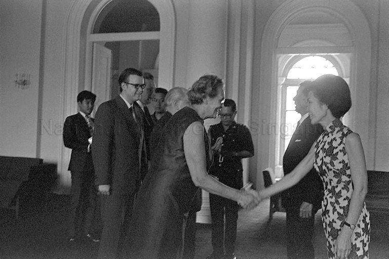 East German Foreign Minister Dr Otto Winzer (hidden) and his wife, who are on a four-day visit to Singapore, calling on President and Mrs Benjamin Sheares at Istana.