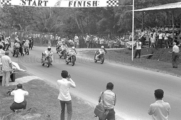 Track photographers at the Singapore Grand Prix 1971 at Sembawang Hills Circuit.
