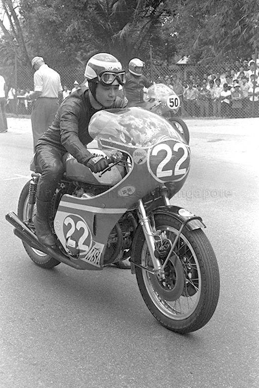 Motorcyclists preparing to ride their motorcycles before the start of the race during the Singapore Grand Prix 1971 at Sembawang Hills Circuit.