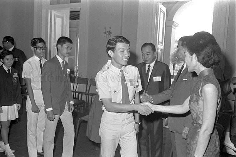 President Dr Benjamin Henry Sheares (second from right) and First Lady Madam Yeo Seh Geok shaking hands with pre-university students during a tea-party at Istana as this is part of the programme of the Seminar on Communism and Democracy.