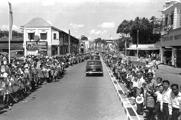 School children lining the road to welcome the arrival of Duke of Edinburgh Prince Philip