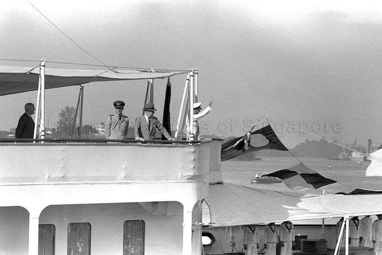 Duke of Edinburgh Prince Philip waving goodbye from the royal yacht Britannia