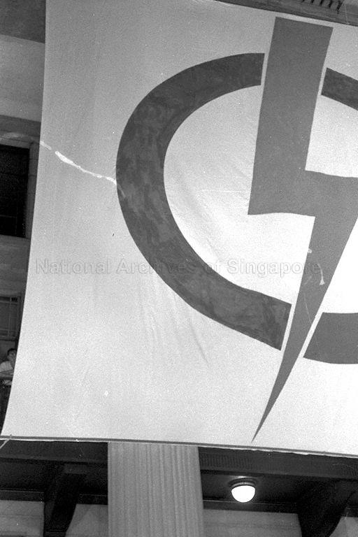 View of People's Action Party (PAP) flag displayed at mass rally held by PAP at City Hall steps after general election