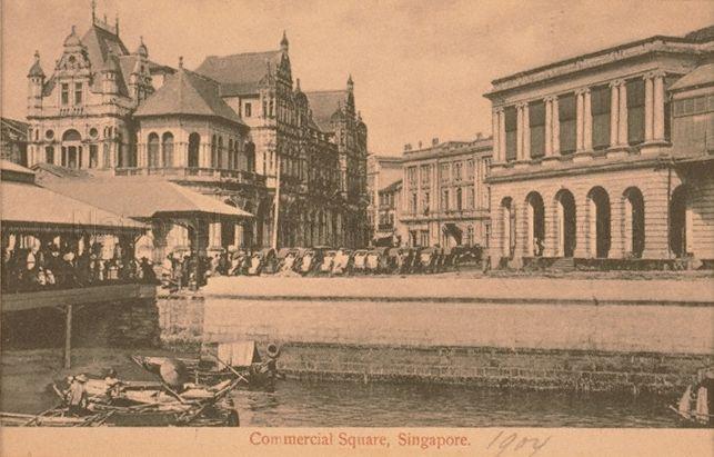 View of Fullerton Square from the sea, including Johnston's Pier on the left, Hongkong and Shanghai Bank behind it, Chartered Bank at top of Battery Road and the Exchange Building on the right