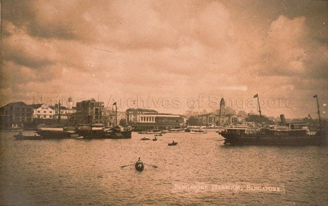View of Singapore seafront with Victoria Memorial Hall and its clock tower (right)