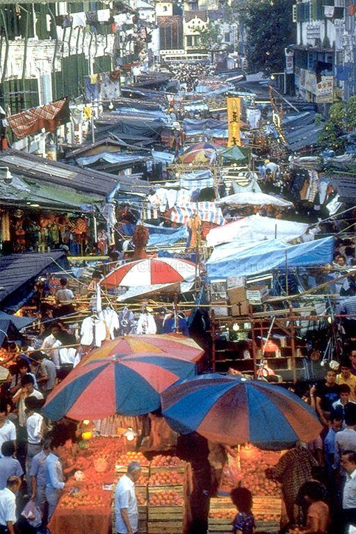 Morning market in Chinatown's Pagoda Street. In the background is South Bridge Road. There can be as many as 1,200 street stalls throughout a typical day in Chinatown according to survey. Most of these stalls are concentrated along Trengganu Street, Sago Street, and Banda Street, with a few spilling into Temple Street and Pagoda Street. The goods sold include food, livestock and perishables.